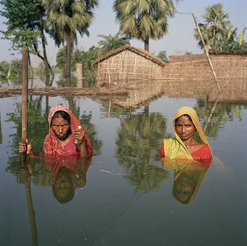 Drowning World: India - Floods - Portrait in floodwaters