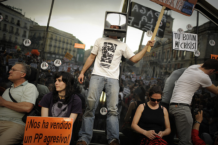 Spain protests: Indignants protesters demonstrate at the Puerta del Sol square in Madrid 