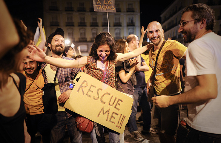 Spain protests: 'Indignants' protesters demonstrate at the Puerta del Sol square in Madrid 