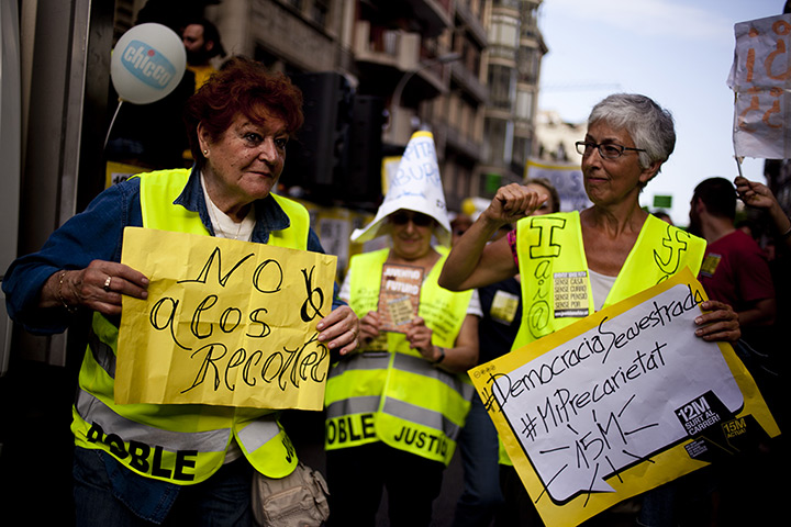 Spain protests: Women protest during a march on the first anniversary of 15M in Barcelona