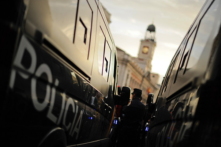 24 hours: Madrid, Spain: Police officers patrol the Puerta del Sol square