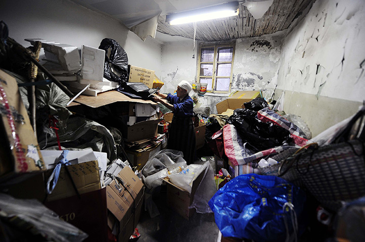 24 hours: Beijing, China: Ninety-year-old Li Xiuying with items collected 