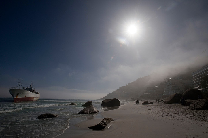 24 hours: Cape Town, S Africa: Japanese fishing trawler, Eihatsu Maru, lies stranded