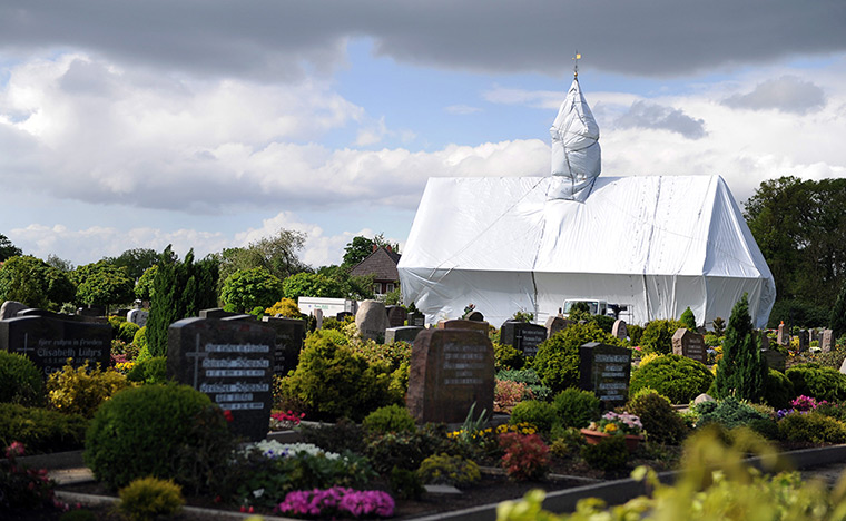 24 hours: Wittorf, Germany: The Saint Nikolaus Chapel is enveloped in white foil