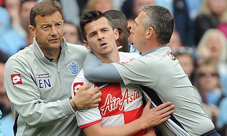 Joey Barton helped off field after red card