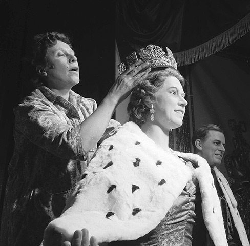 The Queen at Tussauds : circa 1955: A replica of Queen Elizabeth II's crown fitted to her waxwork
