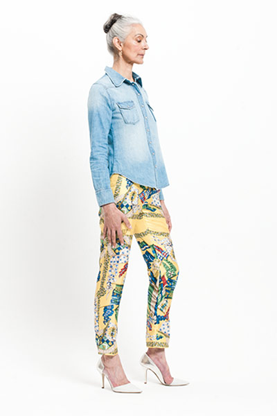 All Ages: All Ages, Pam wears scarf print trousers from D&G work with a demin shirt