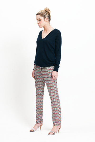 All Ages: All Ages, Chloe wears patterned cocktail trousers with a black jumper