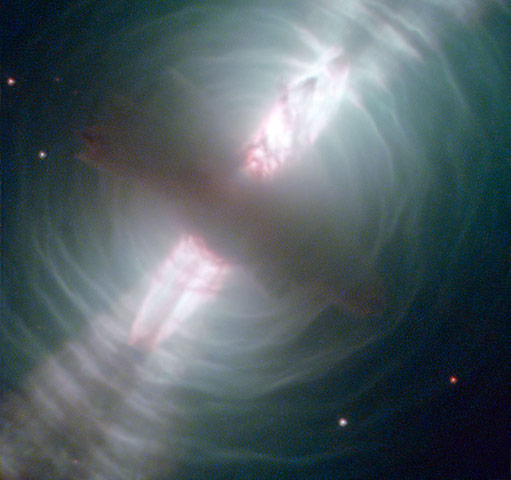 A month in space: Hubble Images Searchlight Beams from a Preplanetary Nebula