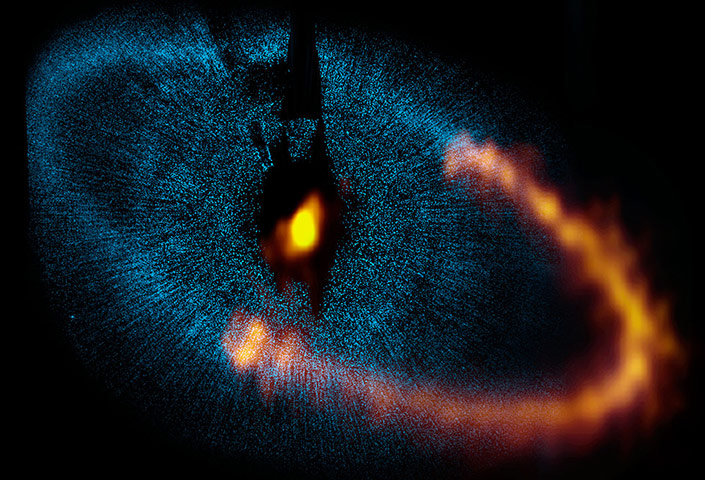 A month in space: dust ring around the bright star Fomalhaut 