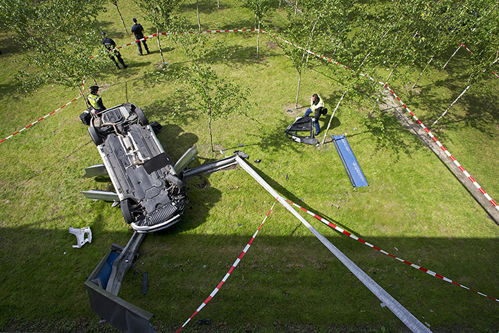 24 hours: Amsterdam, Netherlands: Police officers at the scene of a freak accident