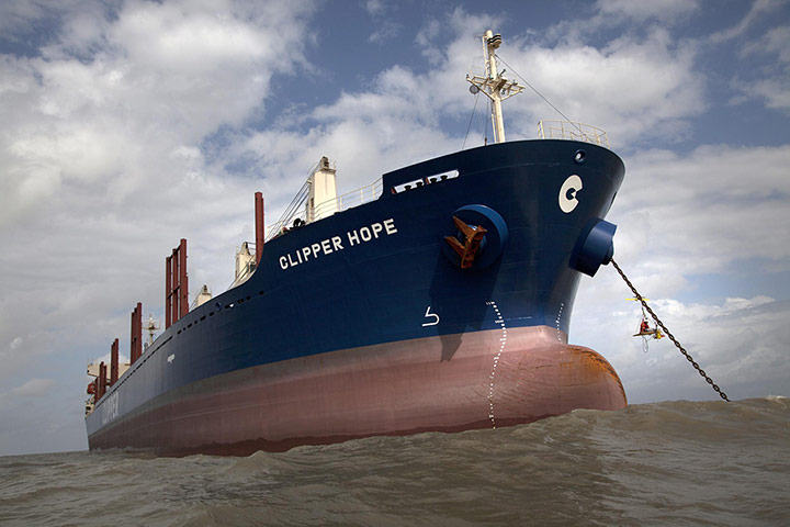 Pig iron in Brazil: Greenpeace activists occupy  the anchor chain of the ship Clipper Hope