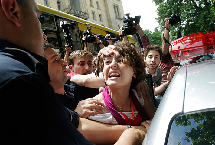 Picture desk live: Police detain a gay rights activist after clashes in Tbilisi