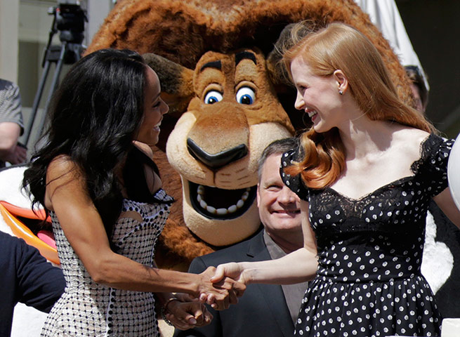 Cannes two: Jada Pinkett-Smith and Jessica Chastain shake hands