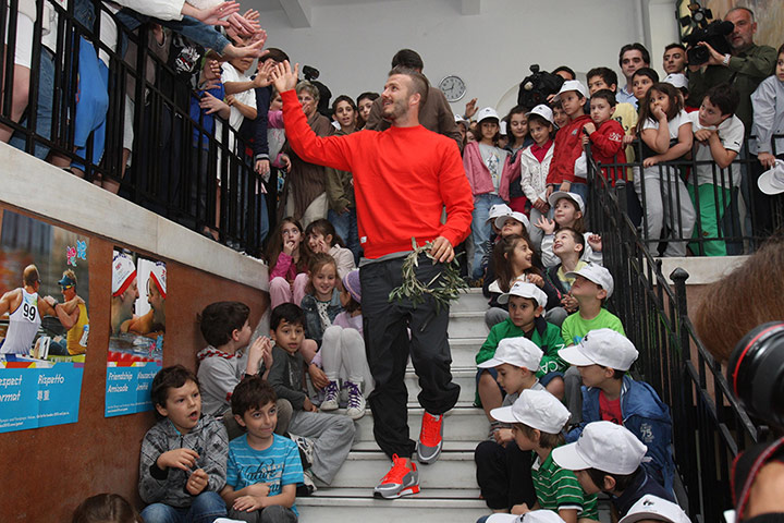 Picture desk live: Lord Coe and David Beckham Visit School