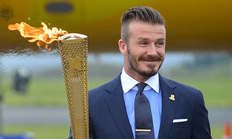 Beckham Latest on London 2012 Olympic Games Ambassador David Beckham Carries The Olympic
