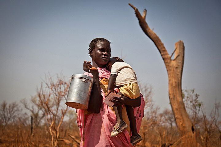 Nuba Mountains Conflict: A displaced woman and her child from the Nuba Mountains in Suda