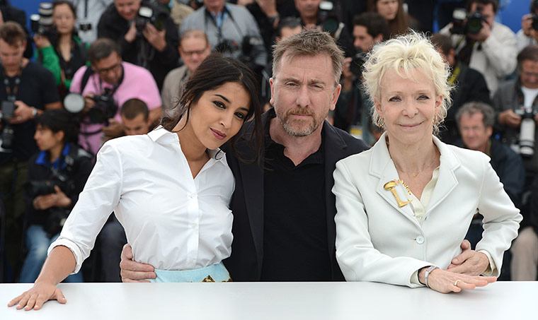 Cannes Day 4: Tim Roth pose with Leila Bekhti and French director Tonie Marshall