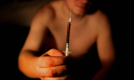 Heroin addict with needle