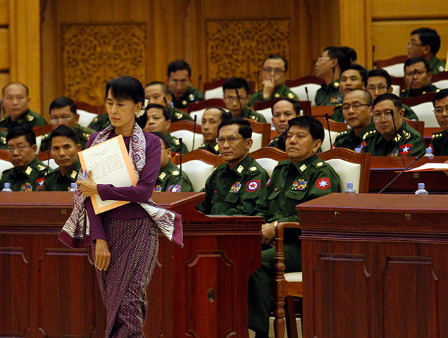 Picture desk live: Aung San Suu Kyi walks to her oath at the lower house of parliament Burma