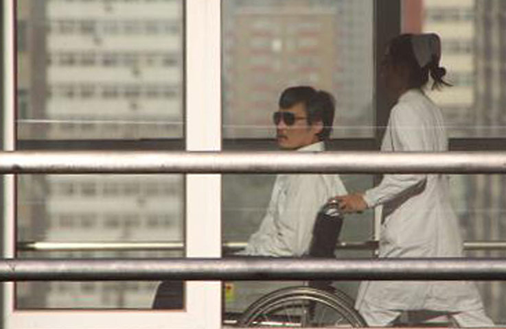 Picture desk live: Chinese activist Chen Guangcheng is seen in a Beijing hospital