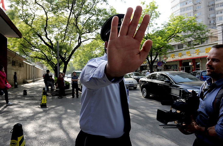 Picture desk live: Police stop journalists at the gate of Chaoyang hospital in Beijing