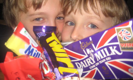 Junior Chamberlains and part of their haul of chocolate