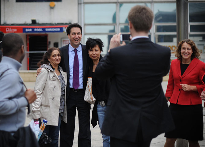 Picture desk live: Ed Miliband poses for a photo with shoppers in Harlow