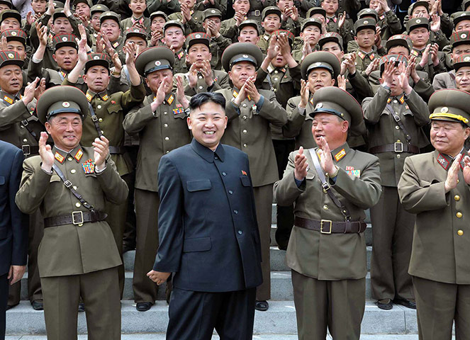 Picture desk live: Kim Jong Un receives a round of applause