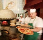 Cooks Busy Preparing Pizza at Trianon Pizzeria