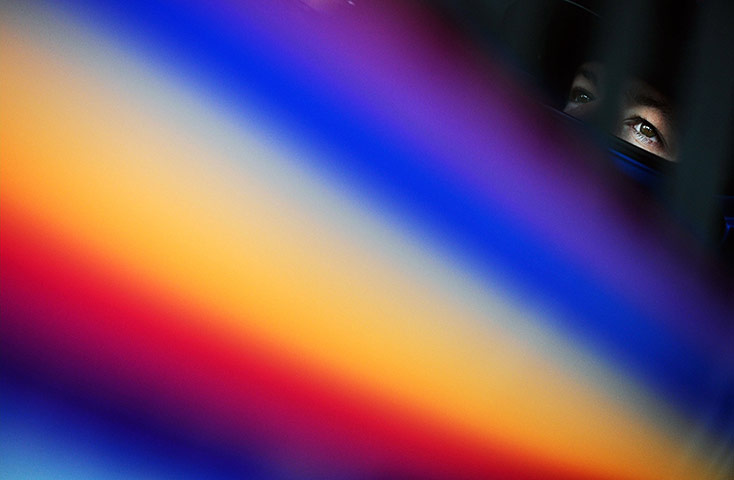 24 hours: Martin Truex Jr. sits in the car before the start of a NASCAR practice race