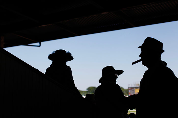 24 hours: Race fans watch preliminary races before the Preakness Stakes  in Baltimore