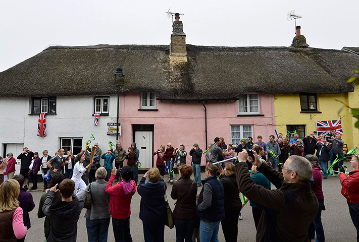 Olympic torch relay day 3: Torchbearer Miranda Bryant runs through Hatherleigh