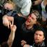NATO summit protests: A bloodied demonstrator calls out 
