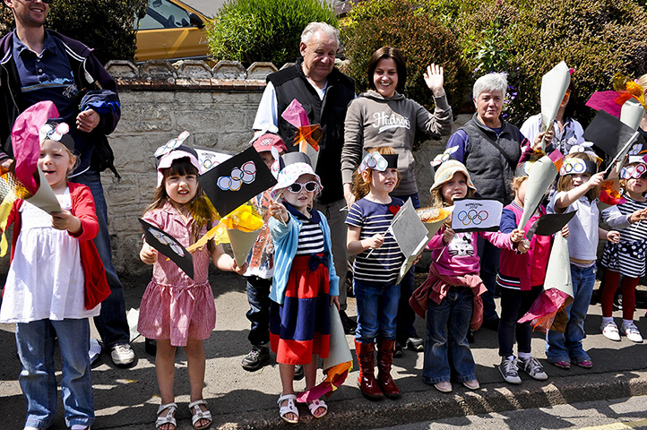 Olympic torch relay day 3: Children in Ilfracoombe, north Devon, after the Olympic torch passed by