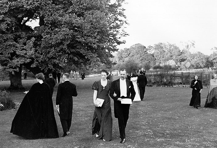 Glyndebourne: Opera-goers walk in the gardens during an interval in 1939