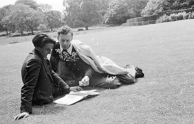 Glyndebourne: Librettist Ronald Duncan sits with Benjamin Britten on the lawn 