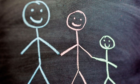 Chalk drawing of a family of two adults and one child 