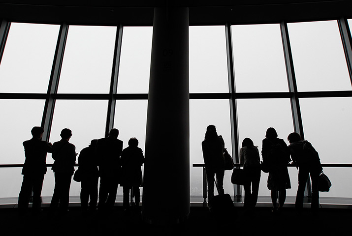 Tokyo Skytree tower opens: Visitors look at a panoramic view of the city from the Tokyo Skytree