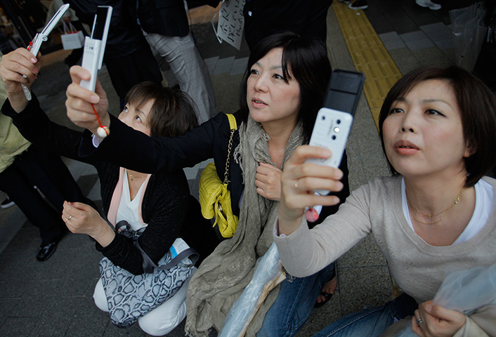 Tokyo Skytree tower opens: Visitors take photos at the grand opening 