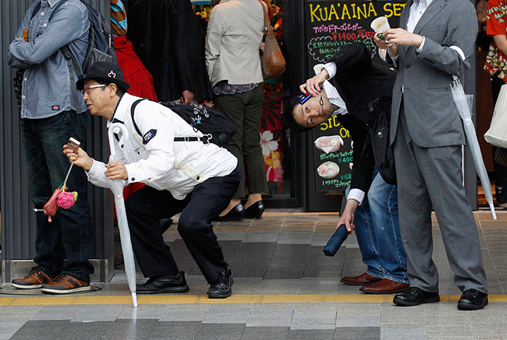 Tokyo Skytree tower opens: Visitors try to take pictures of the Tokyo Skytree