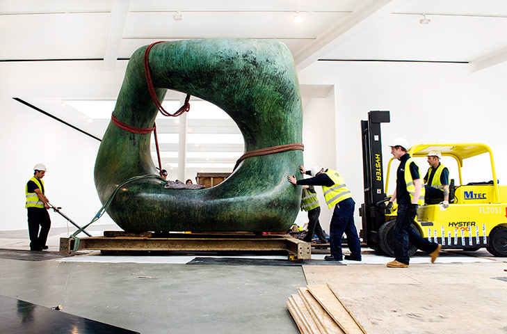 Henry Moore: One half of Henry Moore's Large Two Forms is moved into the gallery