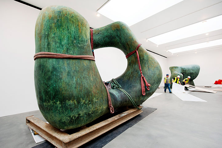 Henry Moore: Workmen lay down masks for the positioning of Henry Moore's Large Two Forms