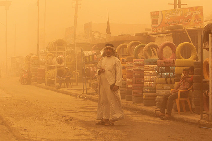 Picture desk live: A dust story in Baghdad, Iraq