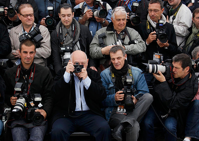 Cannes day 7: Director and photographer Raymond Depardon sits with the photographers