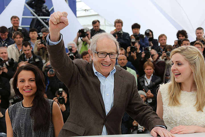 Cannes day 7: Ken Loach punches the air at the photocall for his film The Angel's Share