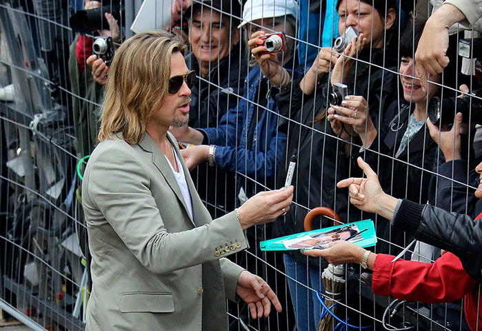 Picture desk live: Brad Pitt arrives for a photocall at the Cannes Film Festival