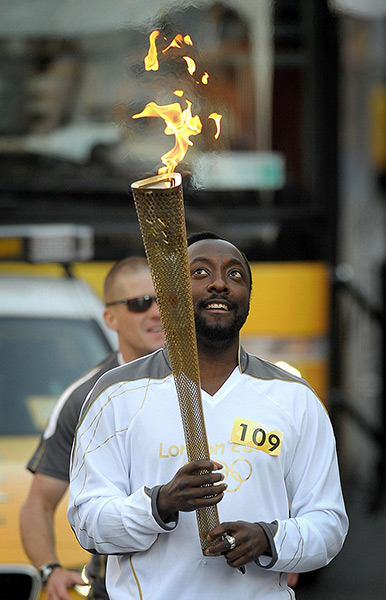 Olympic torch relay day 3: will.i.am carries the Olympic Flame in Taunton