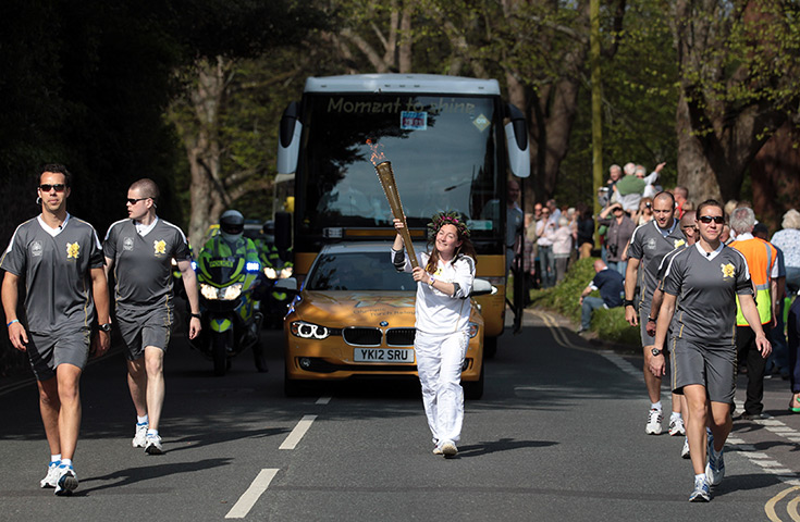 Olympic torch relay day 3: Sarah Milner Simonds runs near Minehead, England