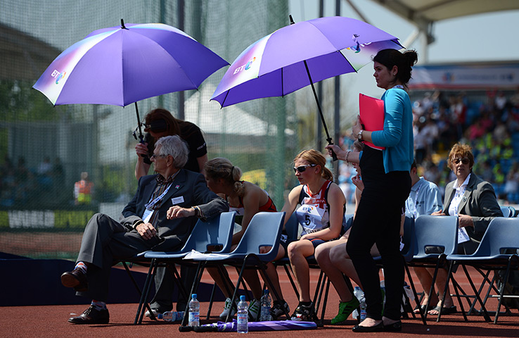 UK weather: Competitors are shielded from the sun at Manchester Regional Arena